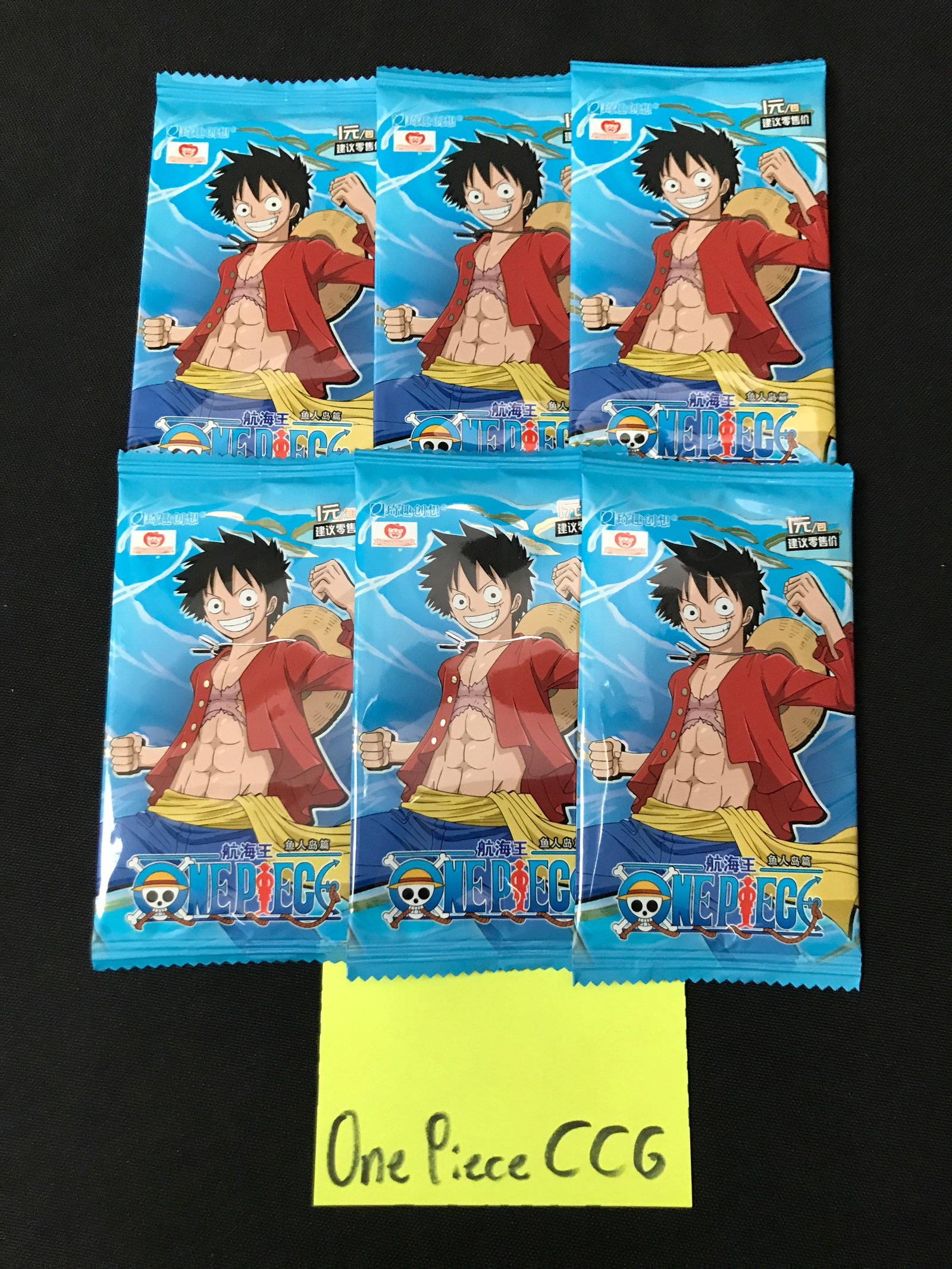 LOT OF 6 ONE PIECE SEALED BOOSTER PACKS: Prices are in Canadian dollars
