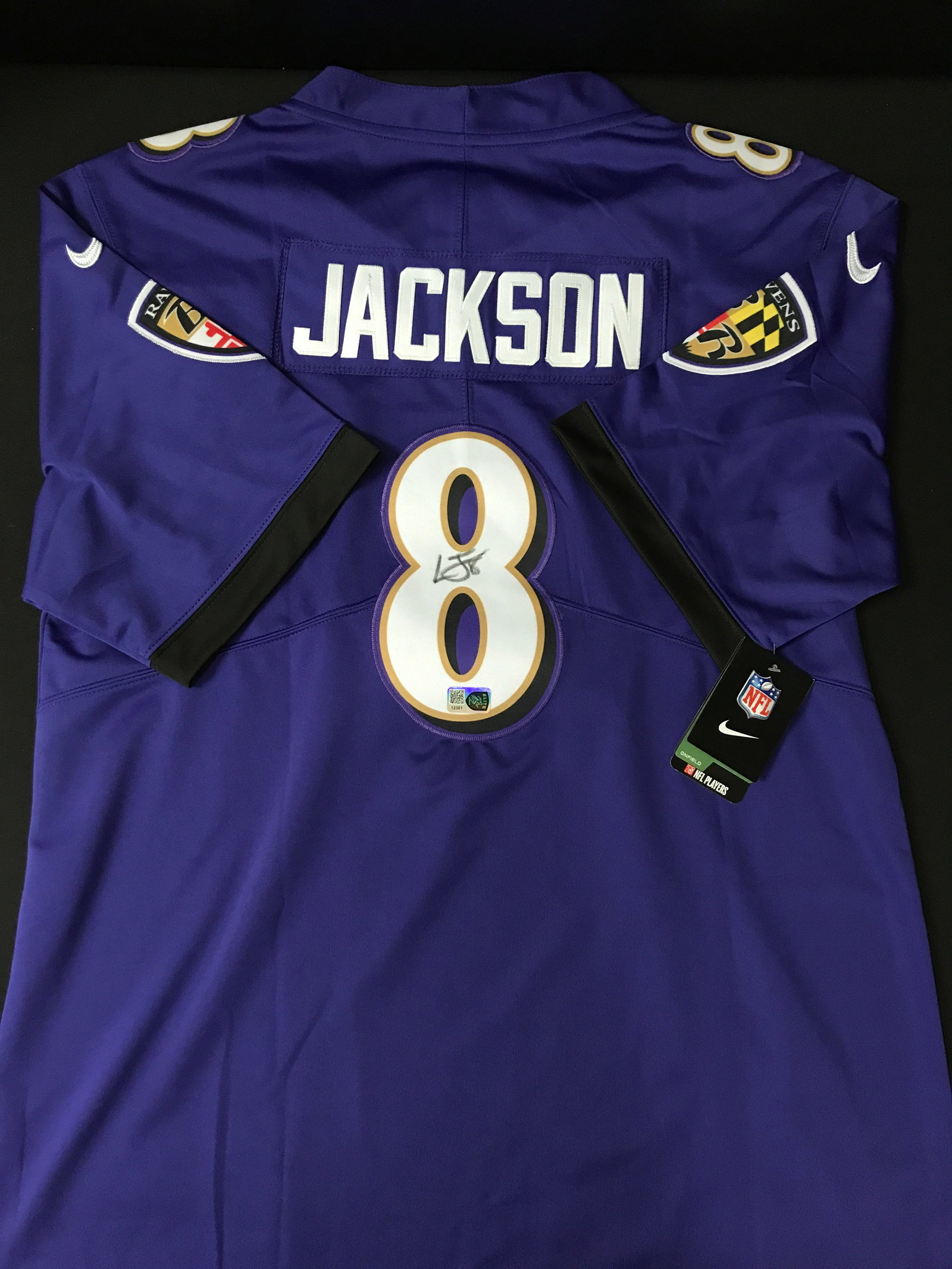 LAMAR JACKSON SIGNED BALTIMORE RAVENS FOOTBALL JERSEY - ELITE COA: Prices are in Canadian dollars