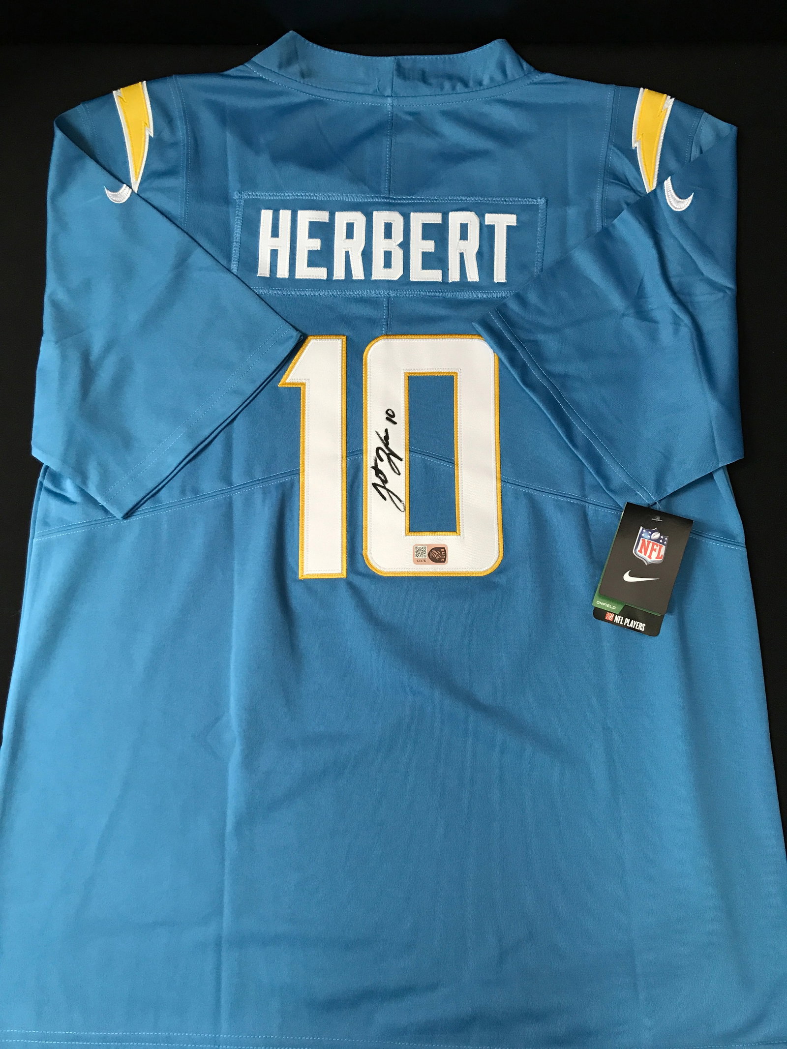 JUSTIN HERBERT SIGNED LOS ANGELES CHARGERS CUSTOM JERSEY - ELITE COA: Prices are in Canadian dollars