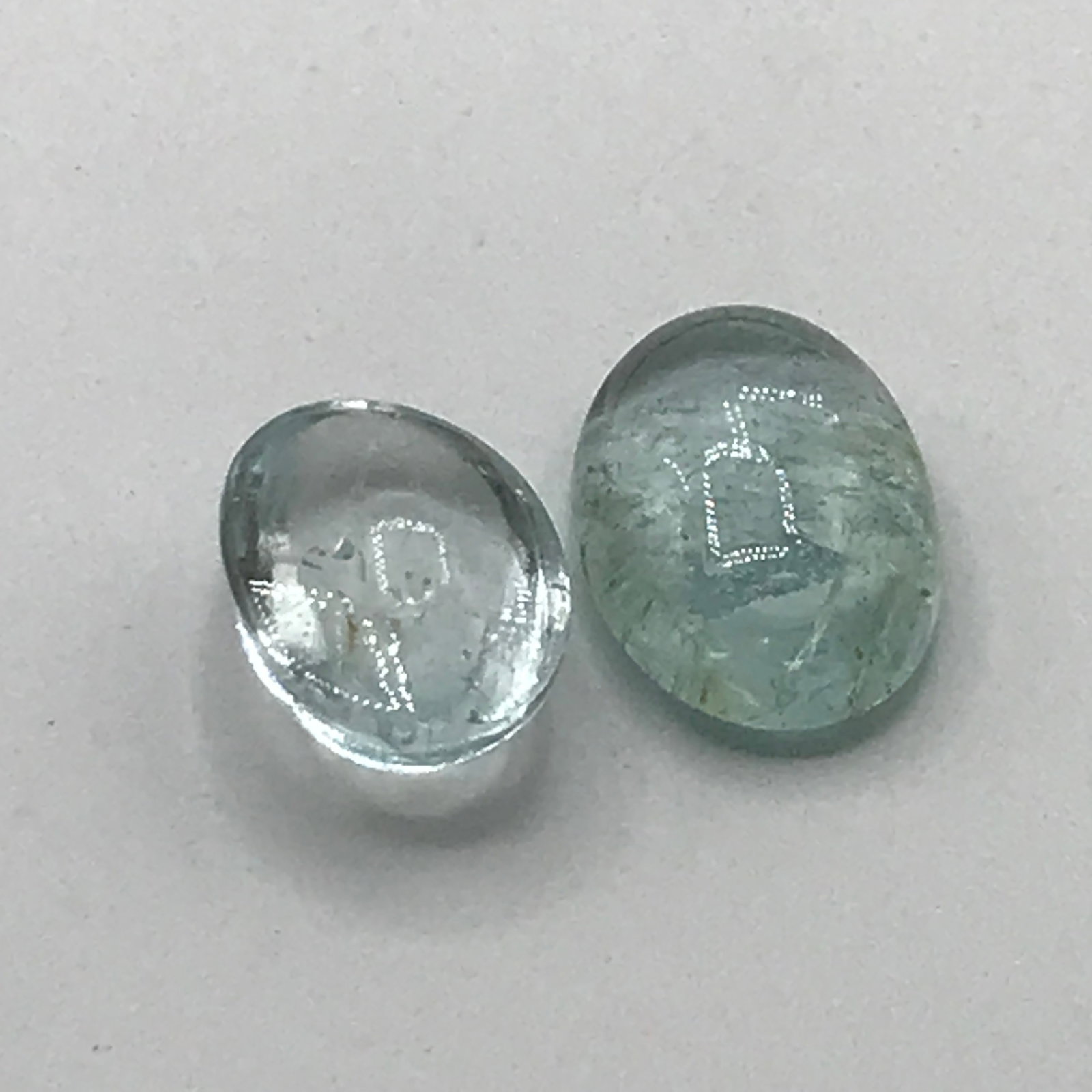 PAIR OF OVAL AQUAMARINES 18.17CT GREENISH-BLUE - UH GEM SERVICES APPRAISED RETAIL VALUE $15,150: Prices are in Canadian dollars