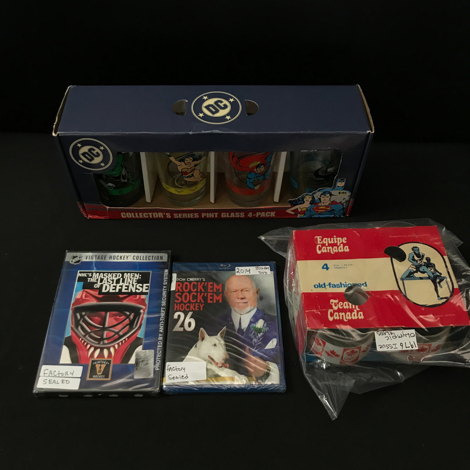 MIXED LOT OF SPORTS AND SUPERHEROES MEMORABILIA: Prices are in Canadian dollars