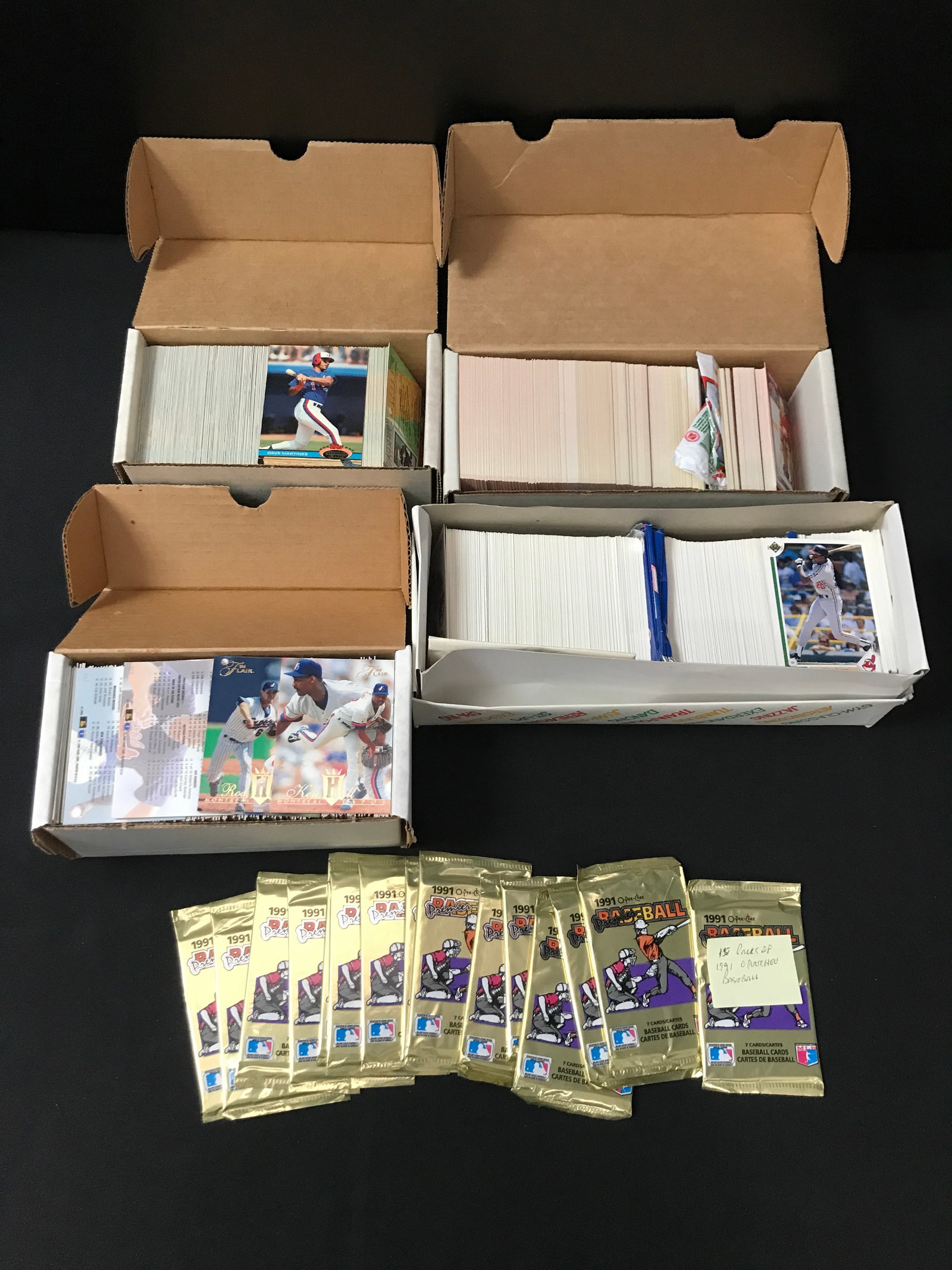 SEVERAL BOXES OF LOOSE BASEBALL CARDS AND 15 SEALED BOOSTER PACKS (1 of 1)