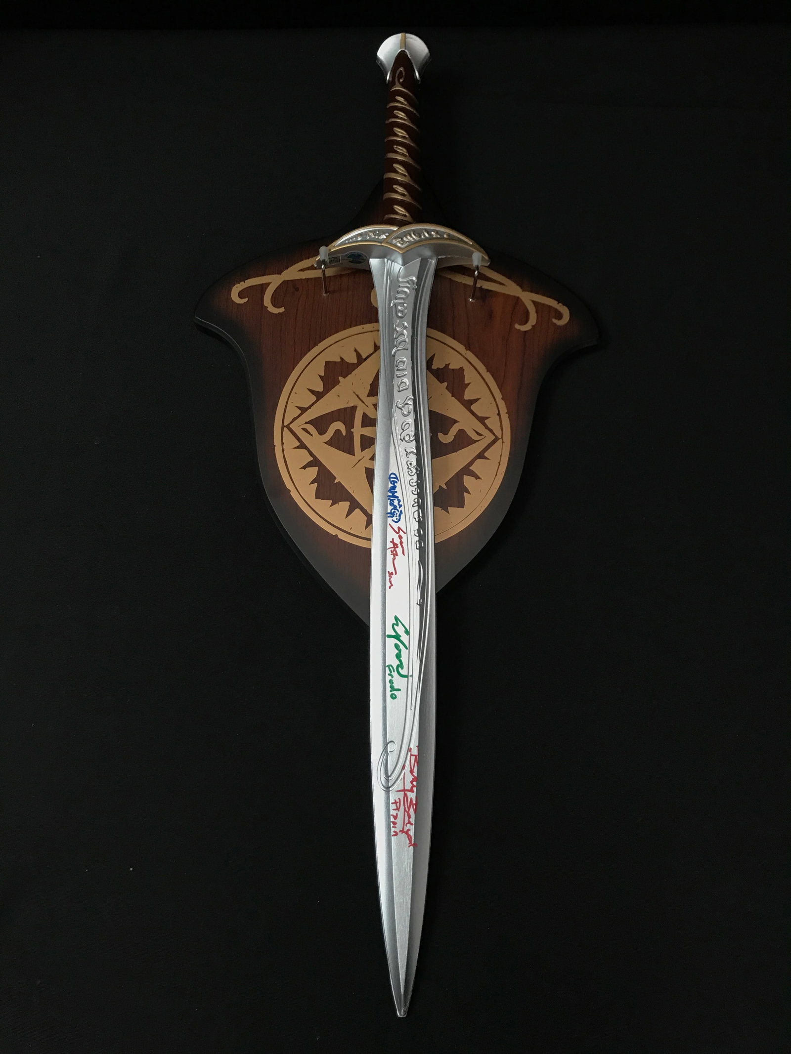 PROP L.O.T.R SWORD SIGNED BY THE HOBBITS: AUSTIN, WOOD, BOYD & MONAGHAN - WWOC COA (1 of 2)