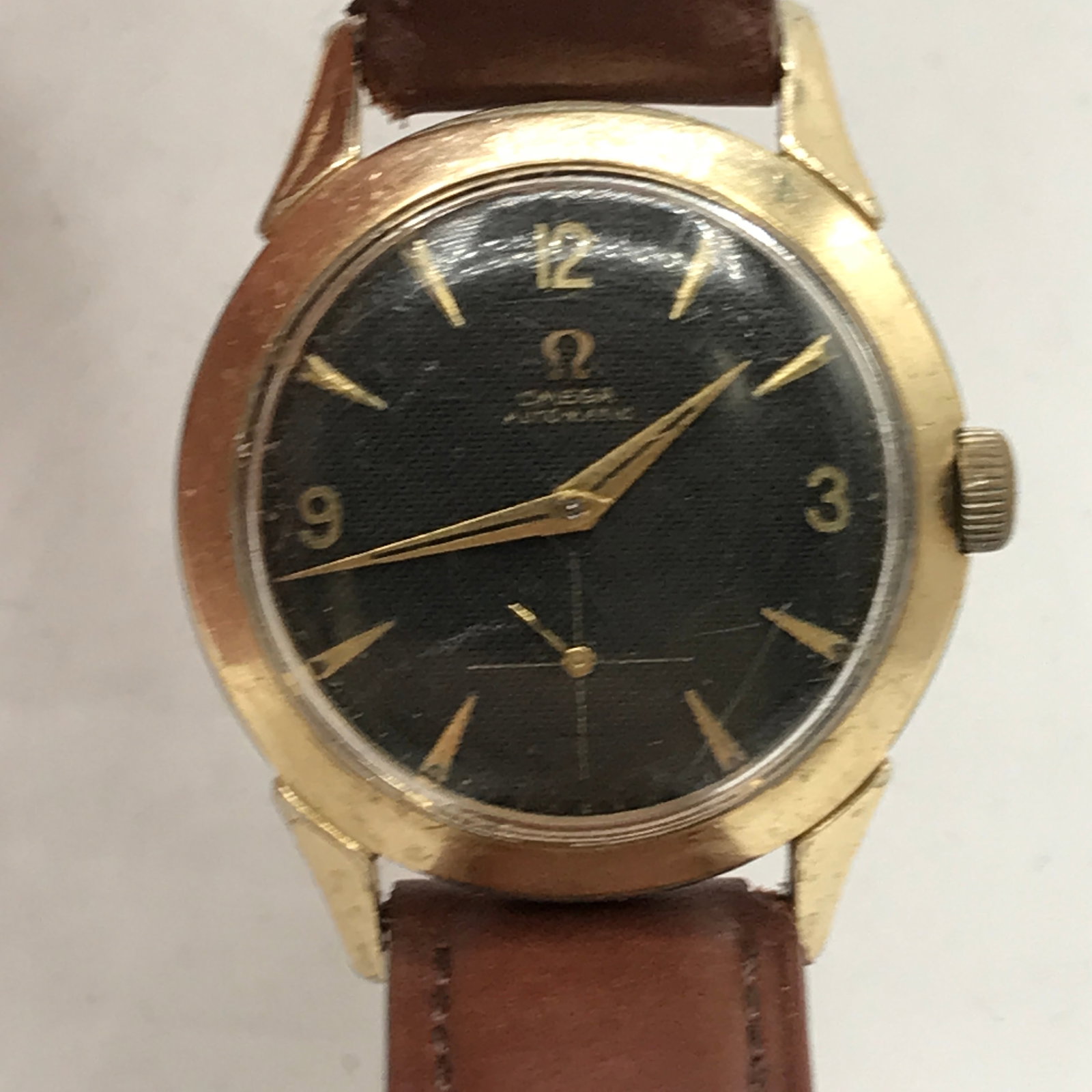 RARE 1952 OMEGA AUTOMATIC BUMPER MENS WATCH WITH BLACK HONEYCOMB DIAL JUST SERVICED AND TIMED: Prices are in Canadian dollarsTHIS WATCH HAS JUST BEEN SERVICED AND TIMED BY THE GERMAN WATCHMAKER IN VANCOUVER