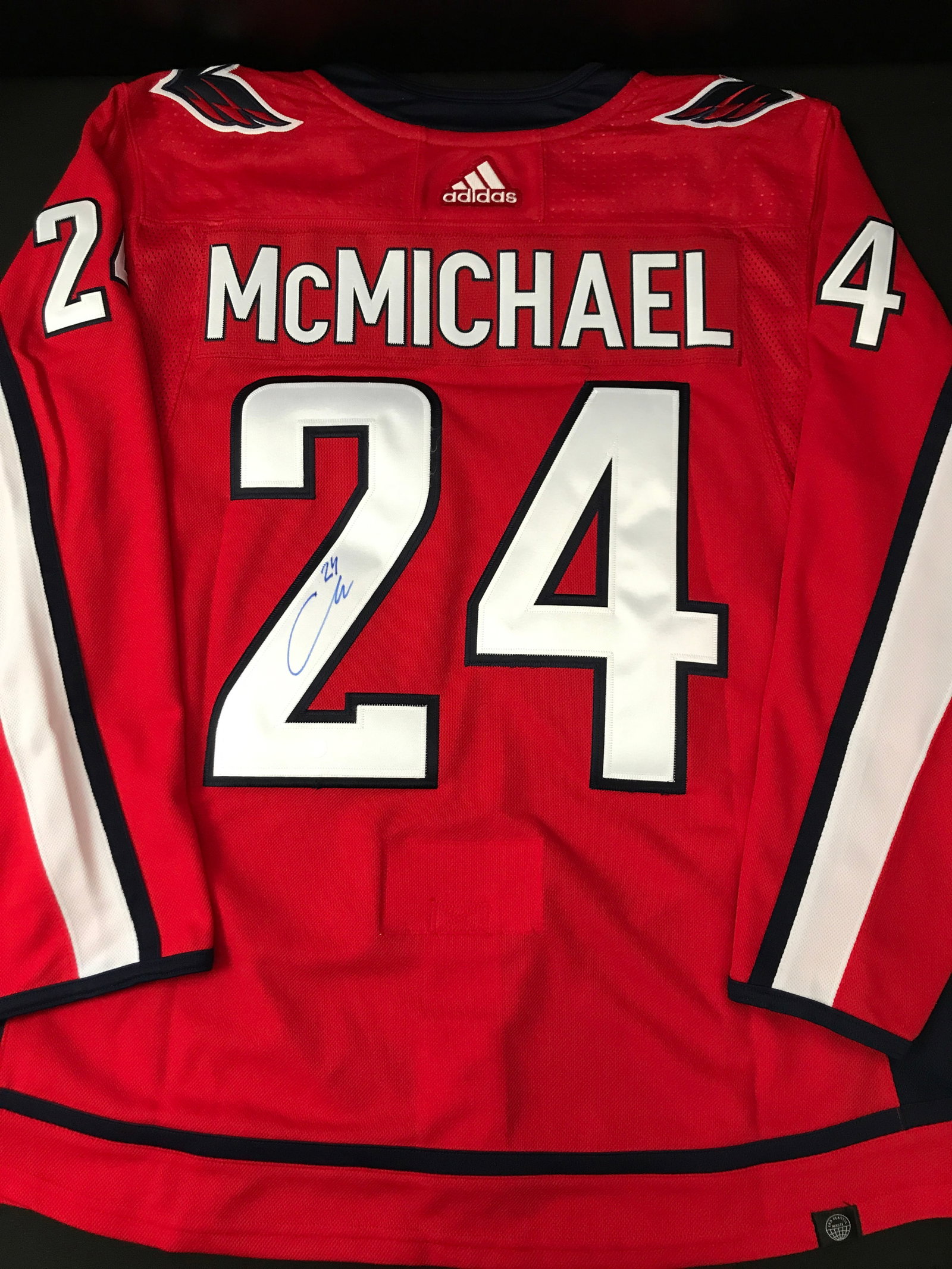 CONNOR MCMICHAEL SIGNED WASHINGTON CAPITALS HOCKEY JERSEY - FRAMEWORTH COA: Prices are in Canadian dollars