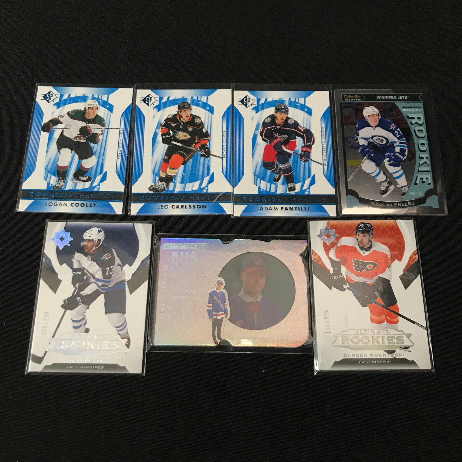 LOT OF 7 HOCKEY TRADING CARDS - INCLUDING ROOKIES: Prices are in Canadian dollars