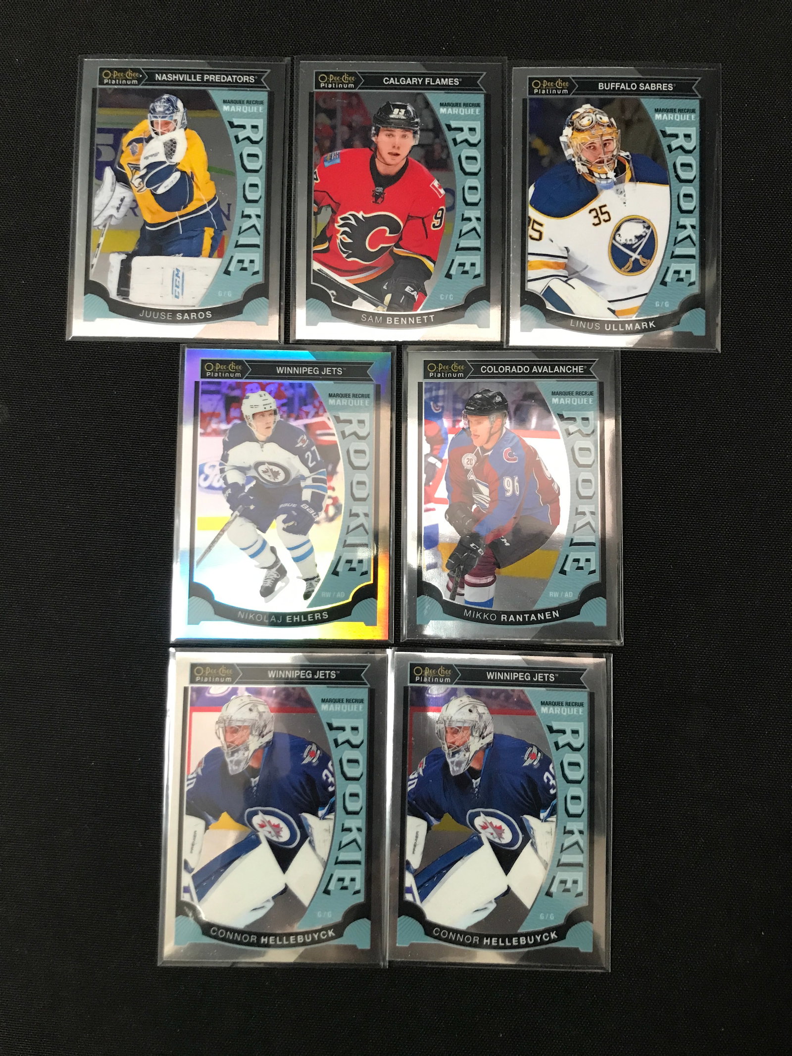 LOT OF 7 OPC ROOKIE HOCKEY TRADING CARDS: Prices are in Canadian dollars