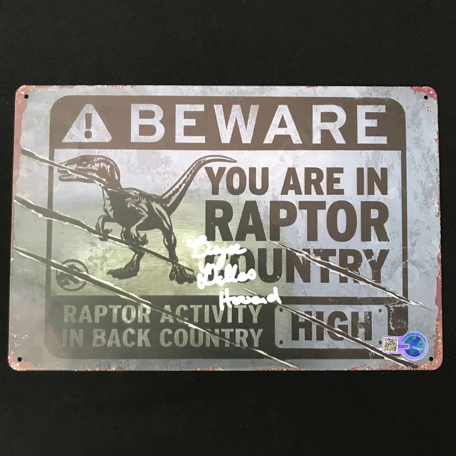 BRYCE DALLAS HOWARD SIGNED JURASSIC PARK TIN SIGN - WWOC COA: Prices are in Canadian dollars