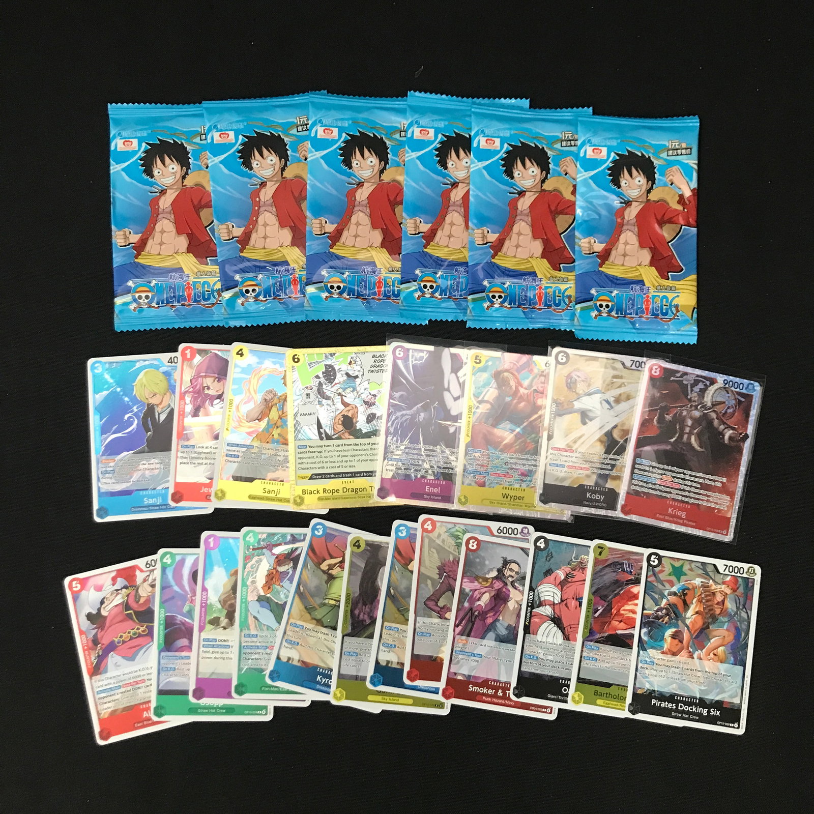 LOT OF ONE PIECE TRADING CARDS - INCLUDING 6 SEALED BOOSTER PACKS: Prices are in Canadian dollars