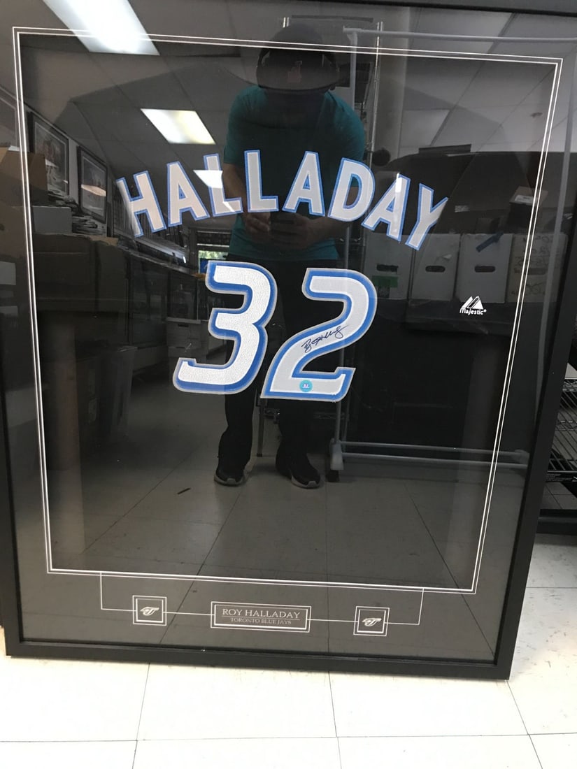 ROY HALLADAY SIGNED AND CUSTOM FRAMED TORONTO BLUE JAYS JERSEY (AJ COA): Prices are in Canadian dollars