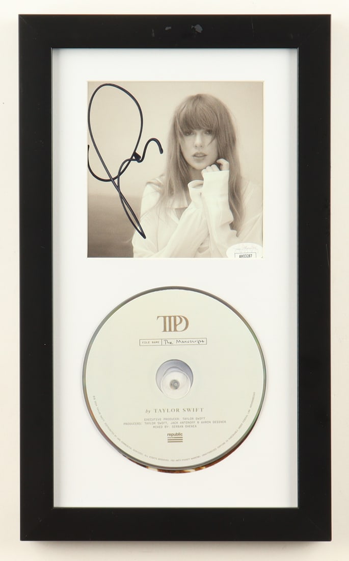 TAYLOR SWIFT SIGNED AND FRAMED CD SLEEVE - JSA COA: Prices are in Canadian dollars