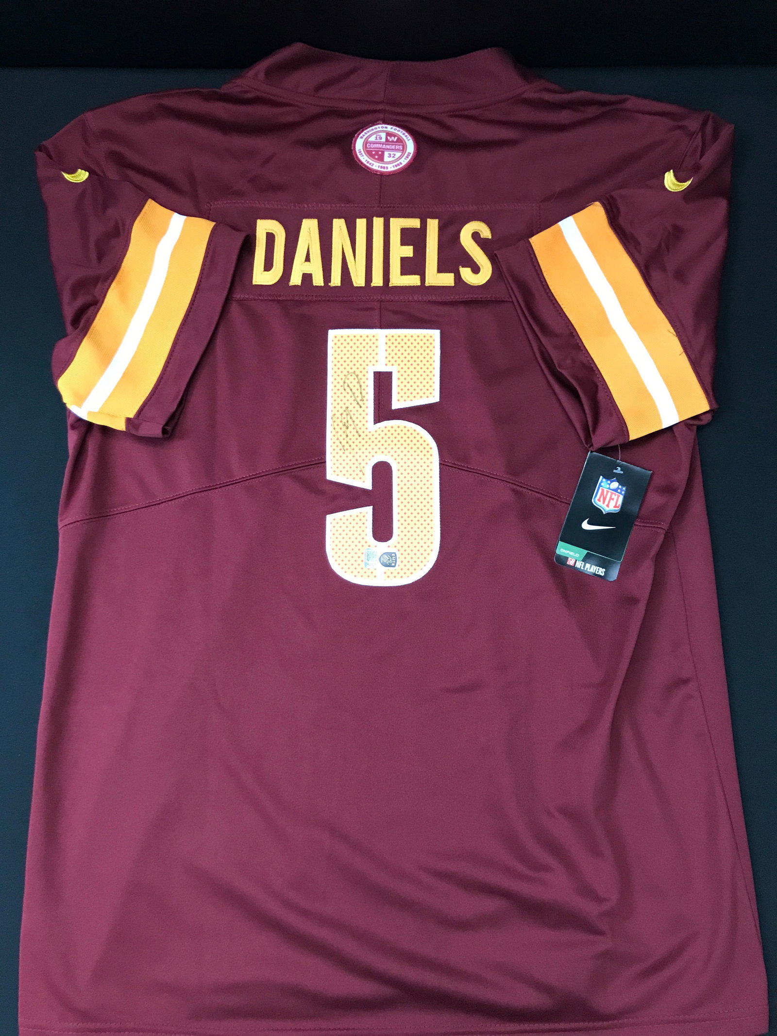 JAYDEN DANIELS SIGNED WASHINGTON COMMANDERS CUSTOM FOOTBALL JERSEY - ELITE COA: Prices are in Canadian dollars