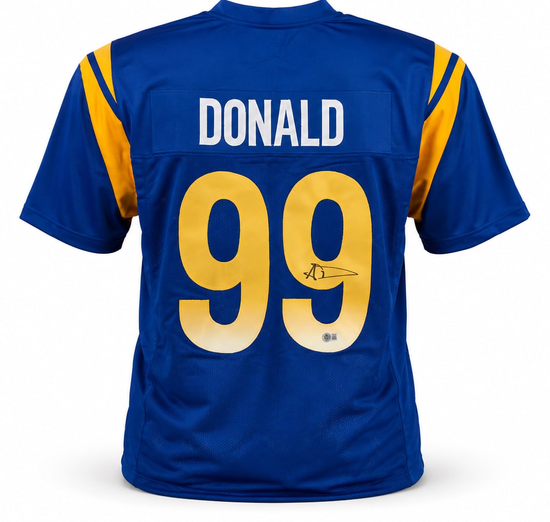 AARON DONALD SIGNED FOOTBALL JERSEY - BECKETT COA: Prices are in Canadian dollars