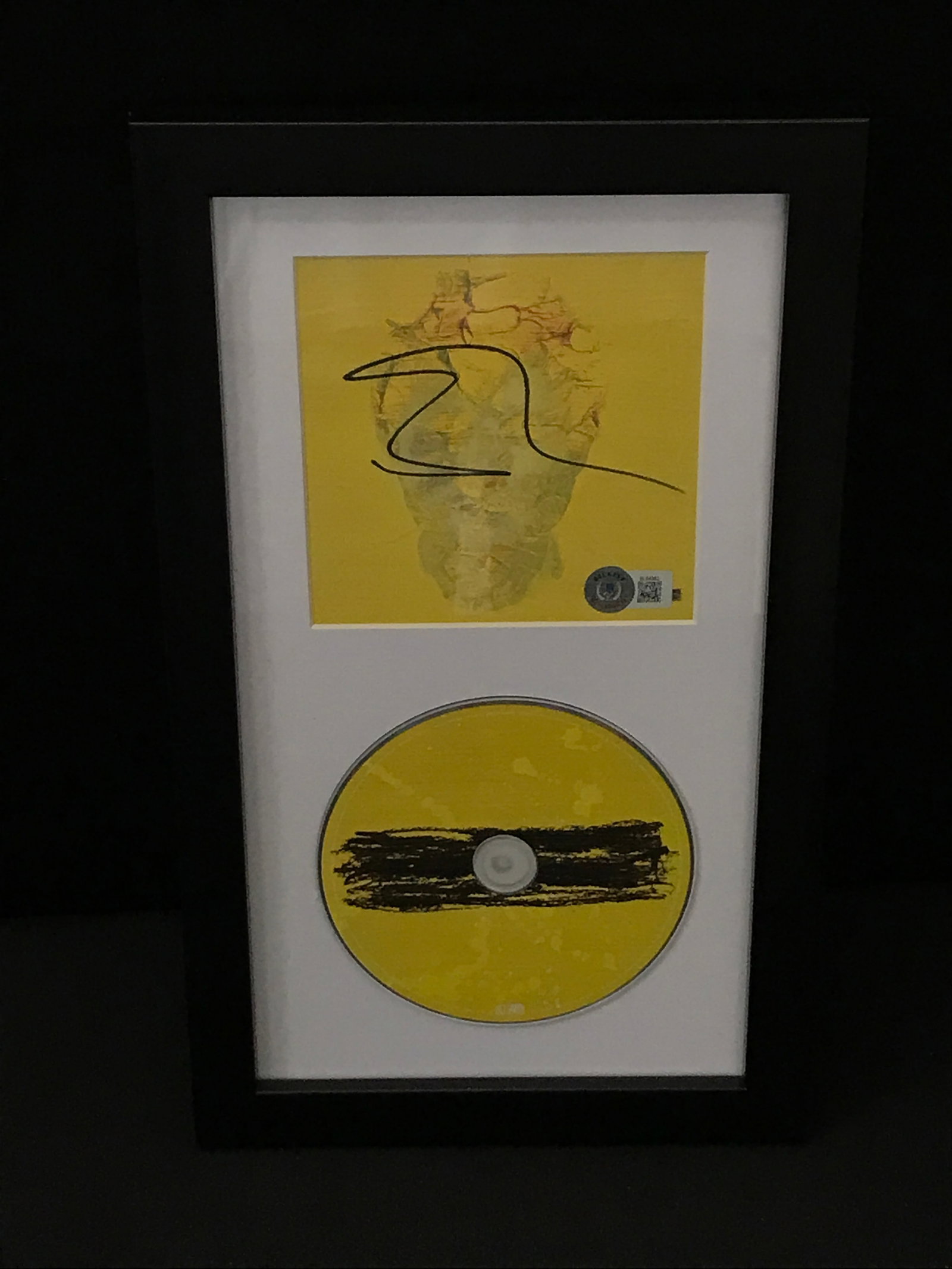 ED SHEERAN SIGNED AND FRAMED CD SLEEVE - BECKETT COA: Prices are in Canadian dollars