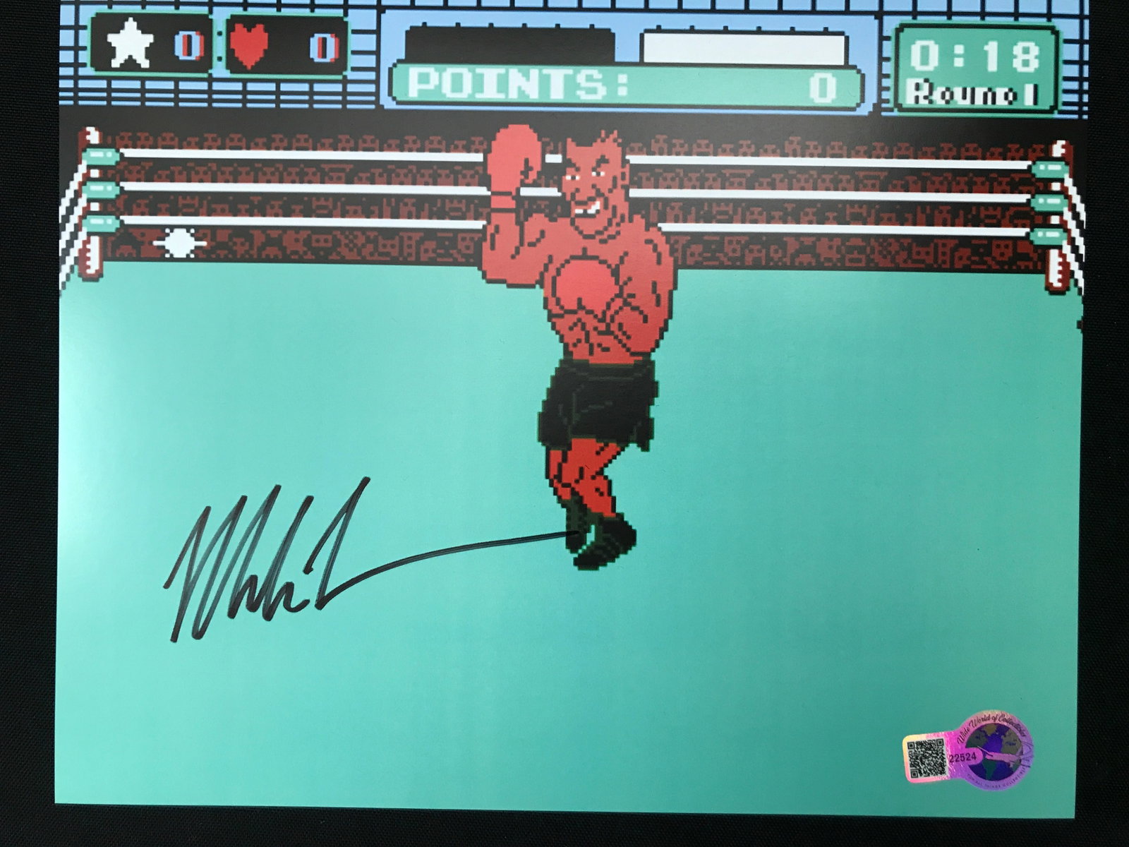 MIKE TYSON SIGNED PUNCH OUT 8X10 - WWOC COA: Prices are in Canadian dollars