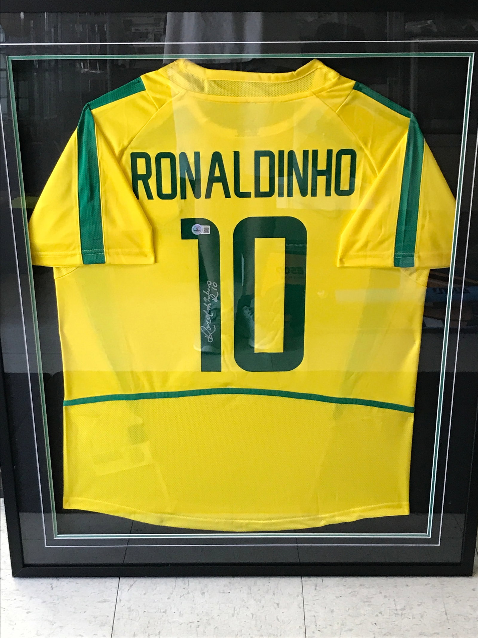 RONALDHINO SIGNED AND FRAMED BRASIL SOCCER JERSEY - BECKETT COA: Prices are in Canadian dollars