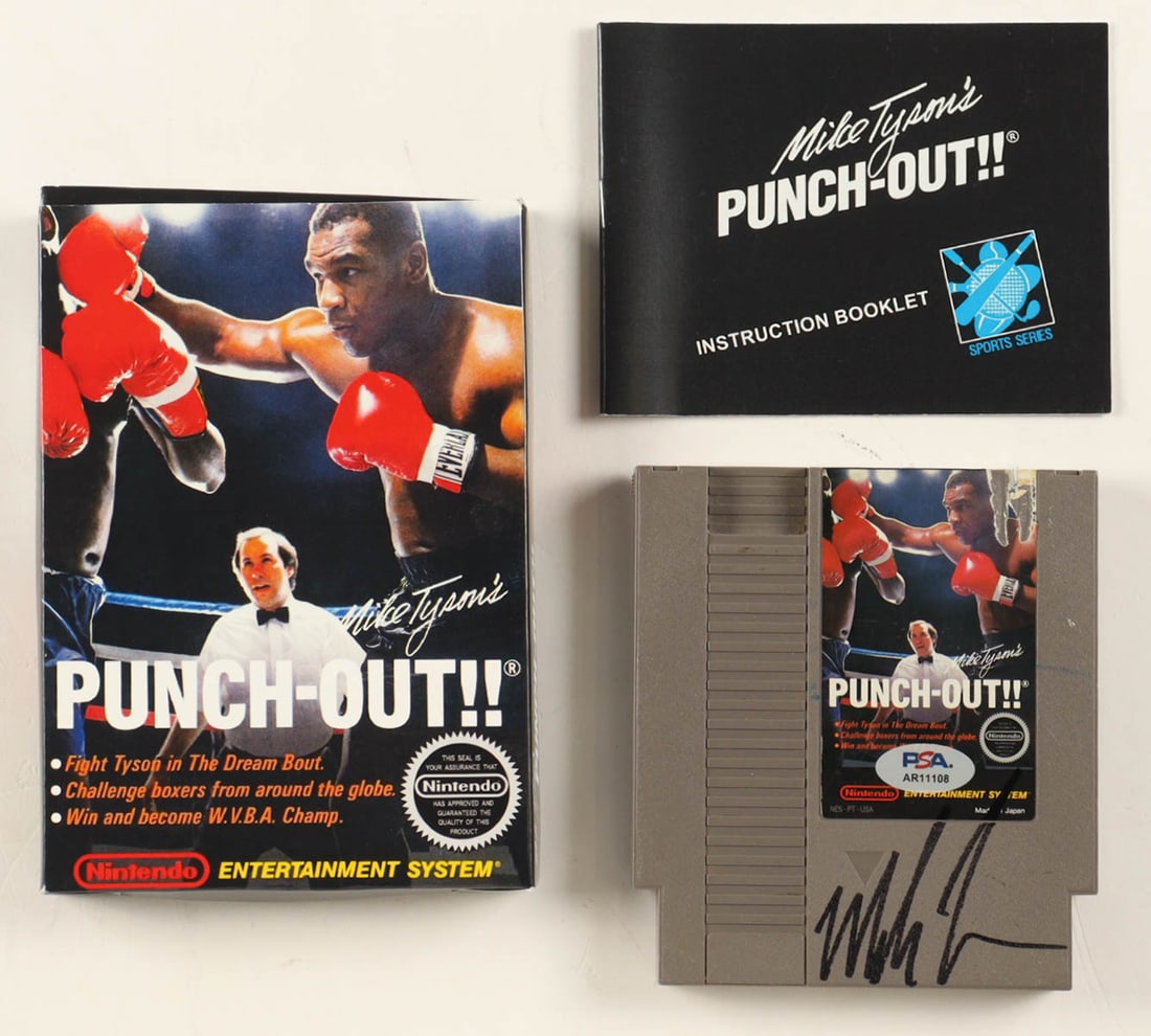 MIKE TYSON SIGNED NES PUNCH OUT GAME CARTRIDGE WITH ORIGINAL PACKAGING - PSA COA: Prices are in Canadian dollars