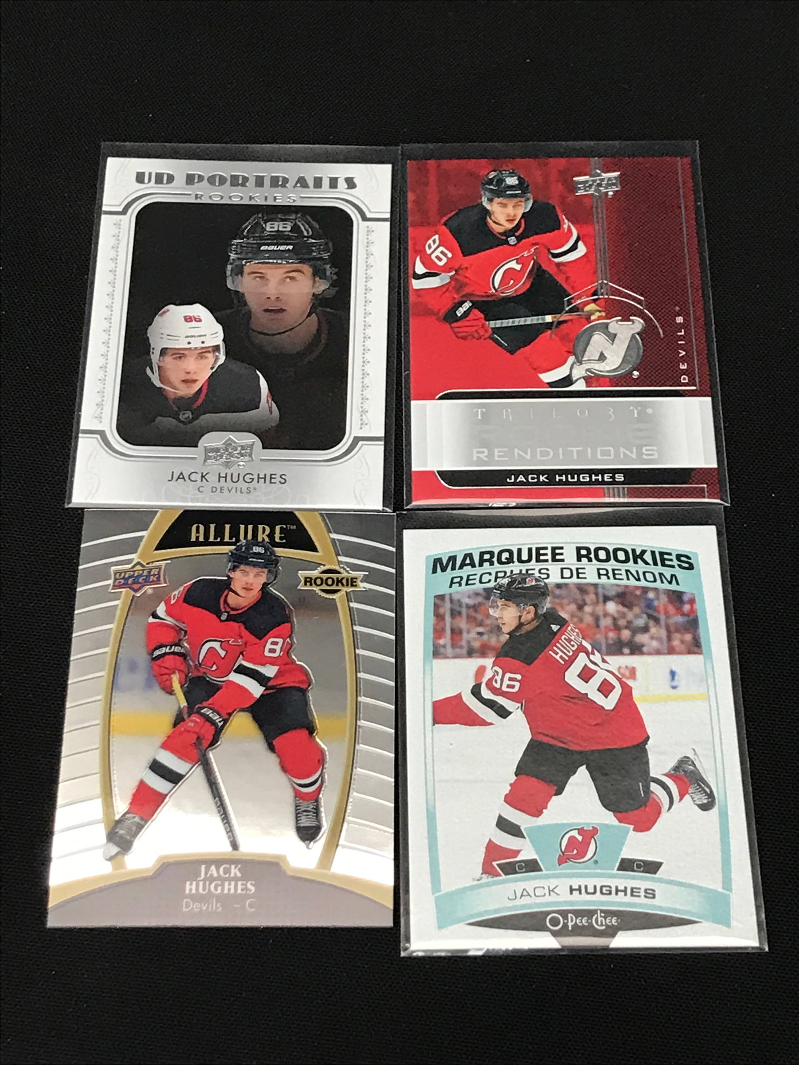 LOT OF 4 JACK HUGHES TRADING CARDS INCLUDING 2 ROOKIES: Prices are in Canadian dollars