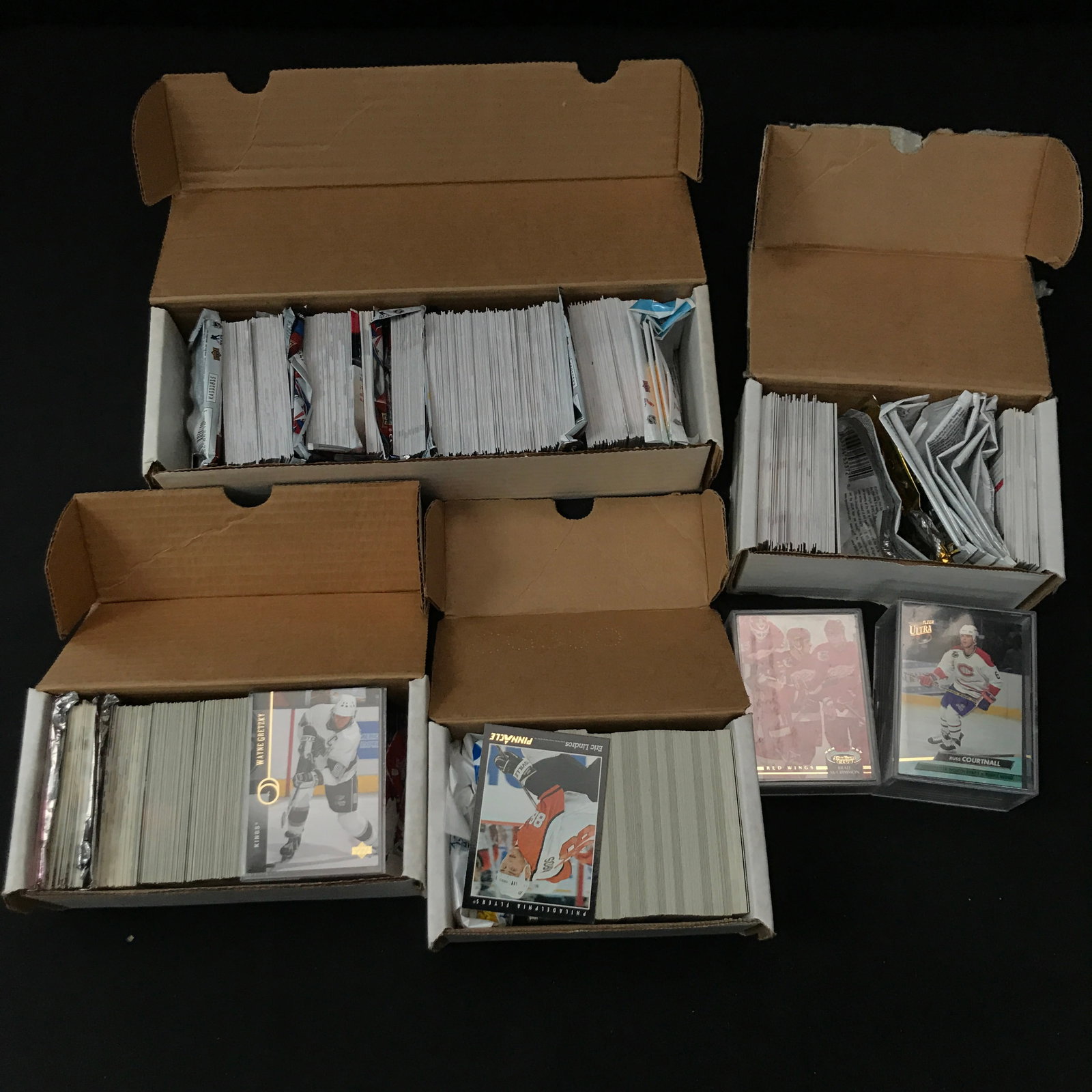 LOT OF 4 BOXES OF SPORTS TRADING CARDS: Prices are in Canadian dollars