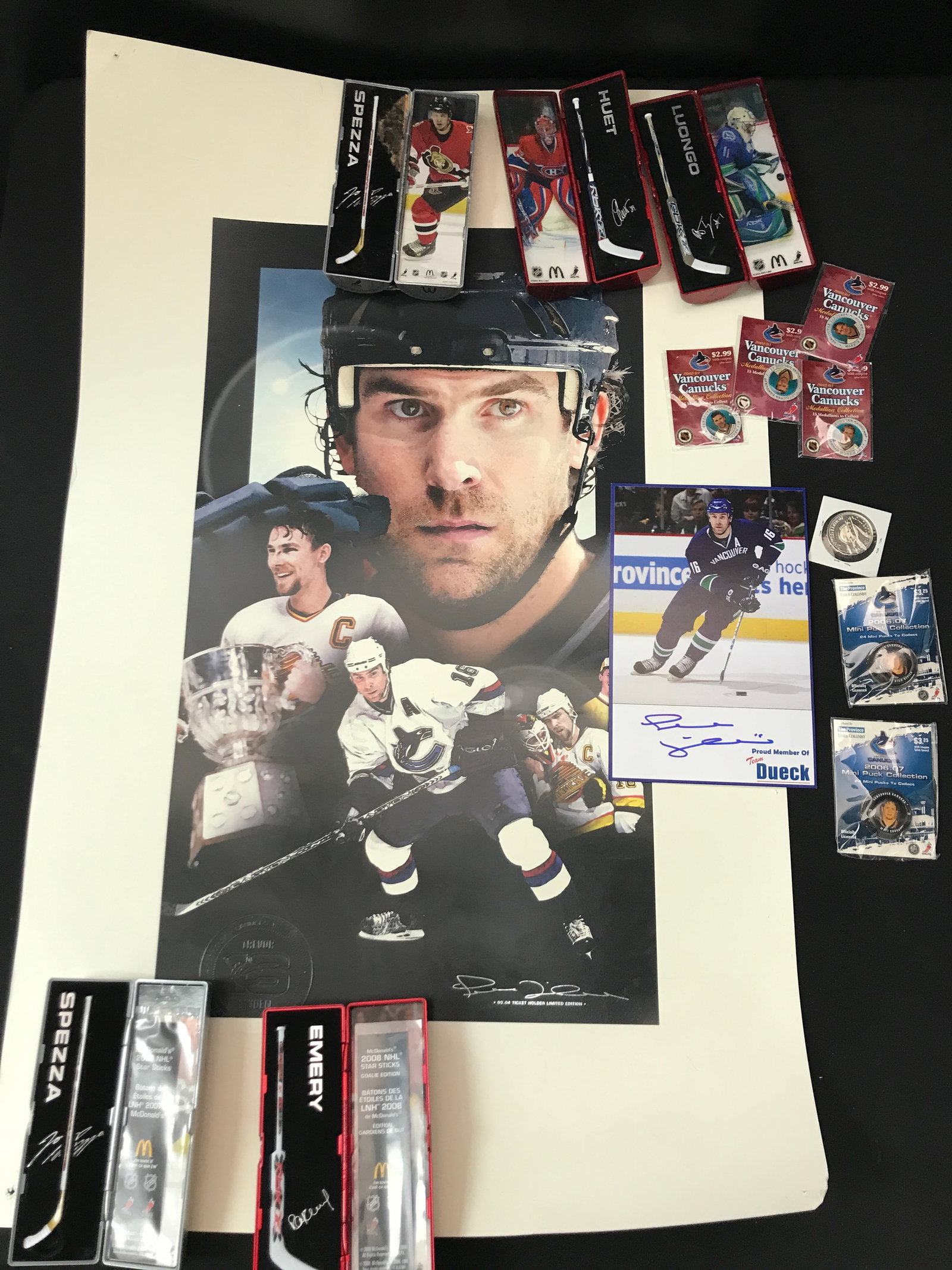 LOT OF HOCKEY MEMORABILIA INCLUDING SIGNED MINI STICKS: Prices are in Canadian dollars