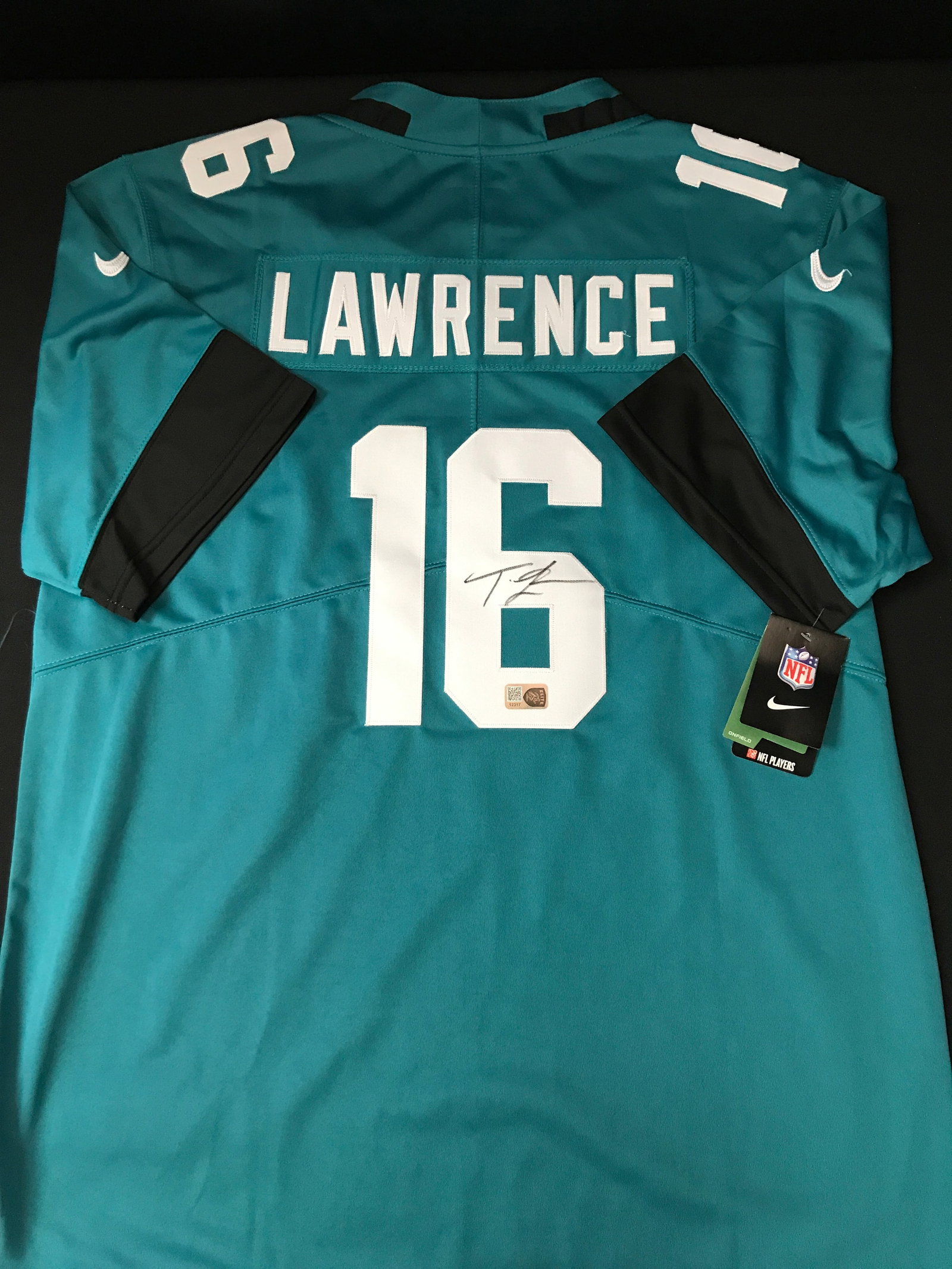 TREVOR LAWRENCE SIGNED JACKSONVILLE JAGUARS CUSTOM JERSEY - ELITE COA: Prices are in Canadian dollars