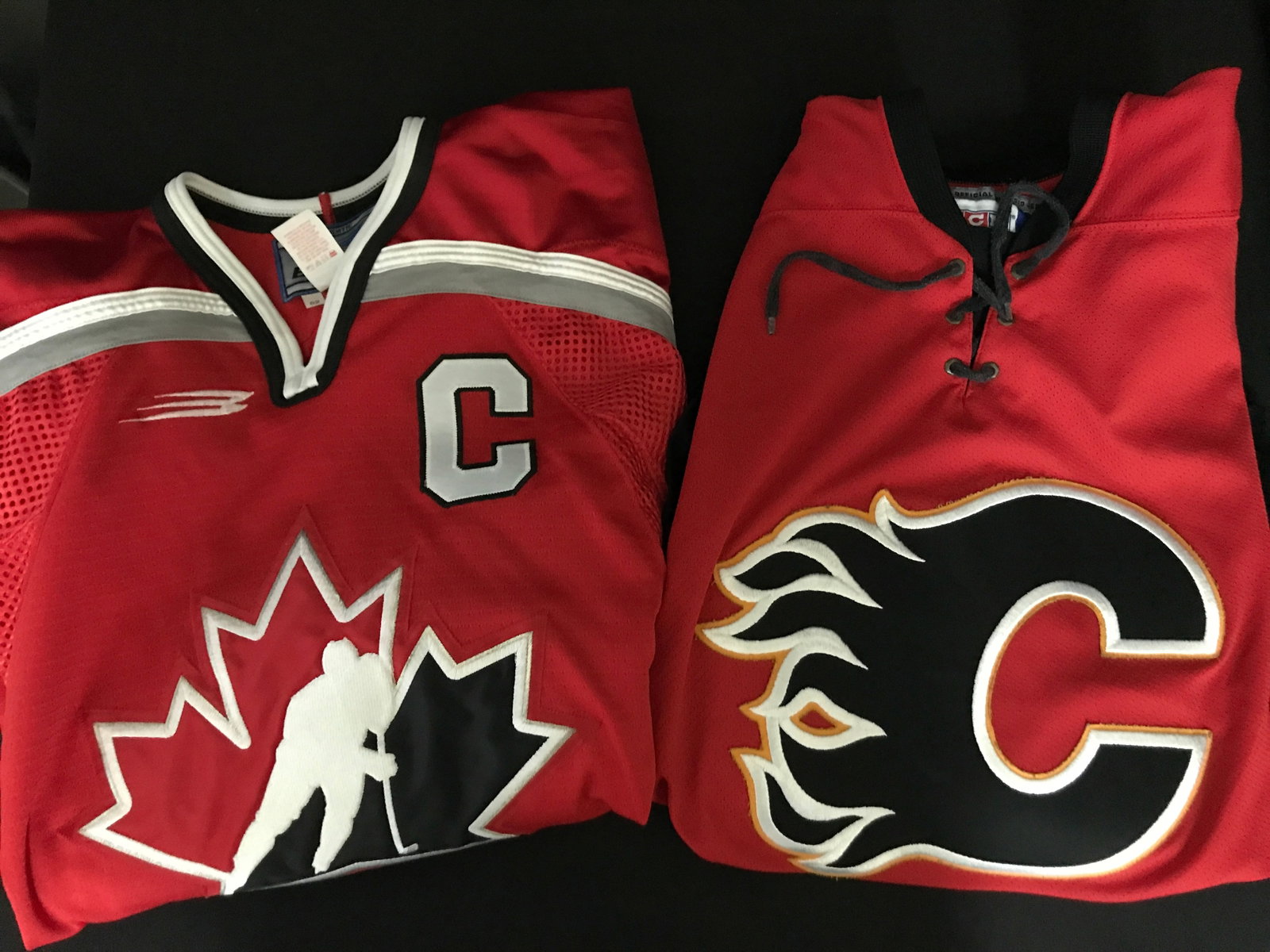2 HOCKEY JERSEYS (LINDROS BAUER PRO TEAM CANADA ): Prices are in Canadian dollars