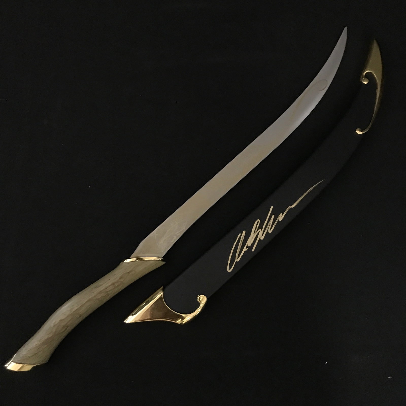 ORLANDO BLOOM SIGNED SWORD SHEATH - WWOC COA: Prices are in Canadian dollars