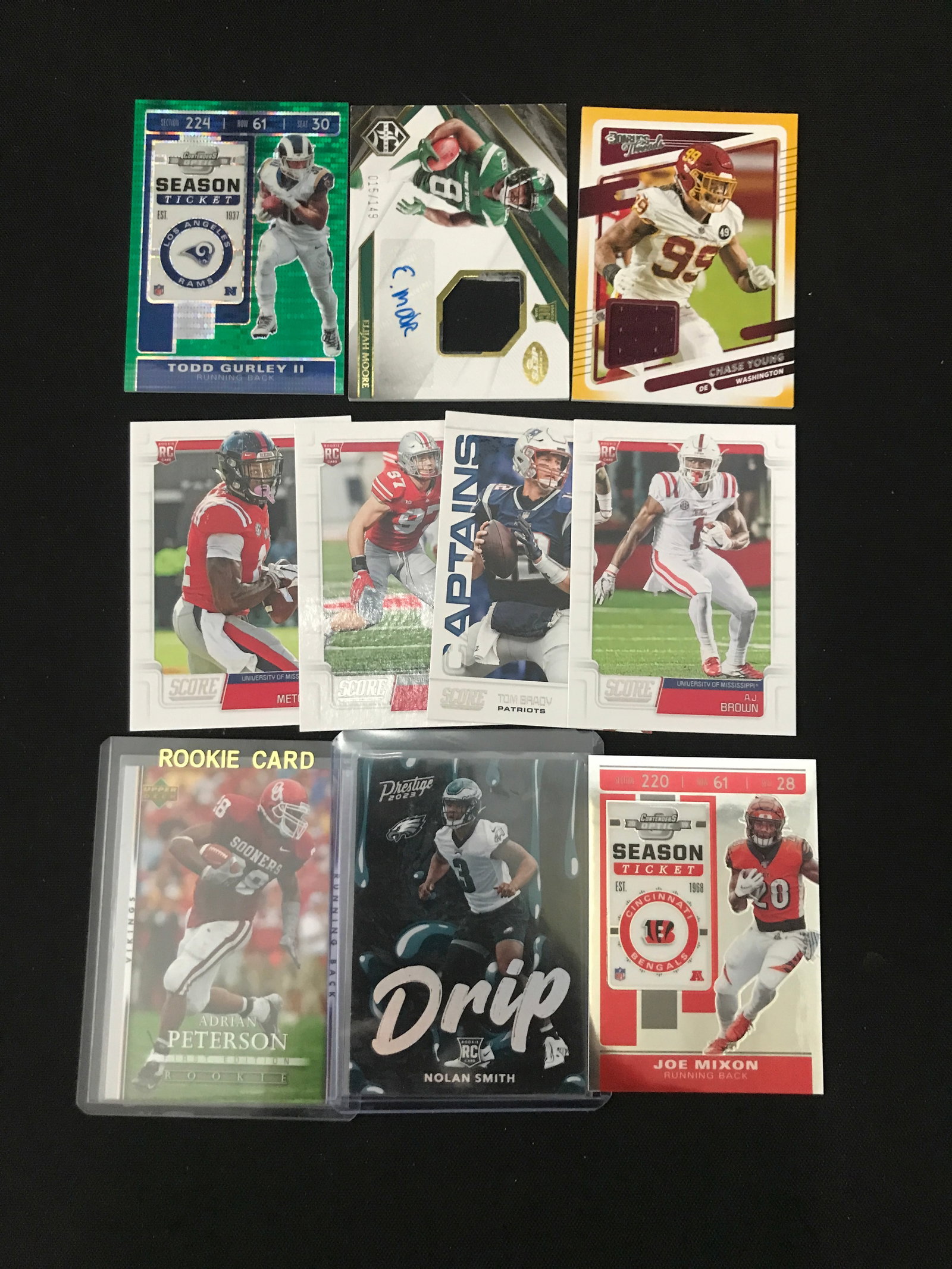 LOT OF 10 FOOTBALL TRADING CARDS INCLUDING SIGNED AND ROOKIES: Prices are in Canadian dollars