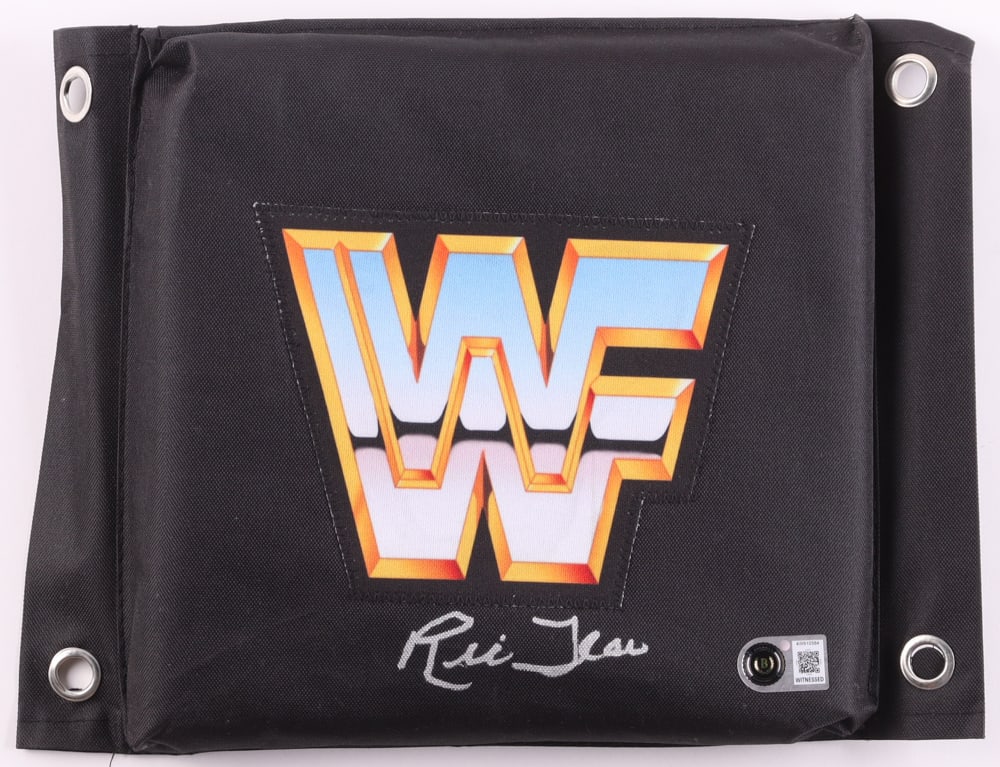 RIC FLAIR SIGNED WF SEAT COVER - BECKETT COA: Prices are in Canadian dollars