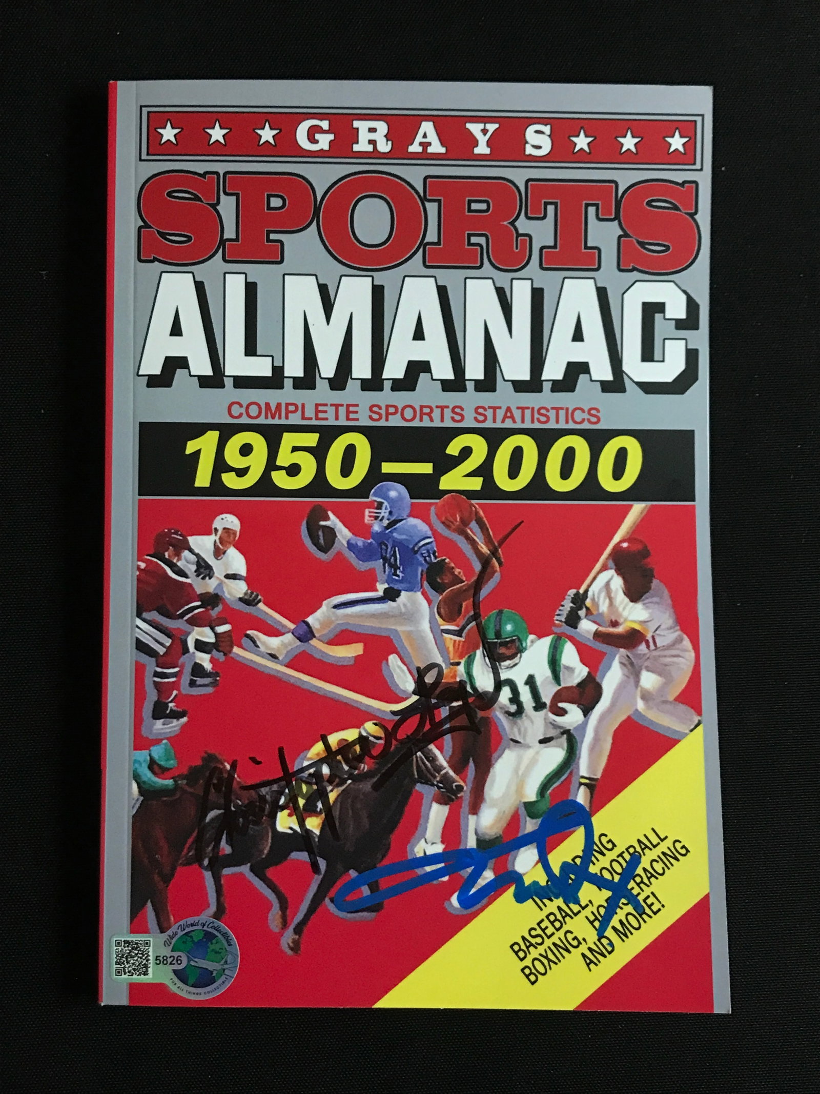 MICHAEL J FOX AND CHRISTOPHER LLOYD DUAL SIGNED SPORTS ALMANAC - WWOC COA: Prices are in Canadian dollars