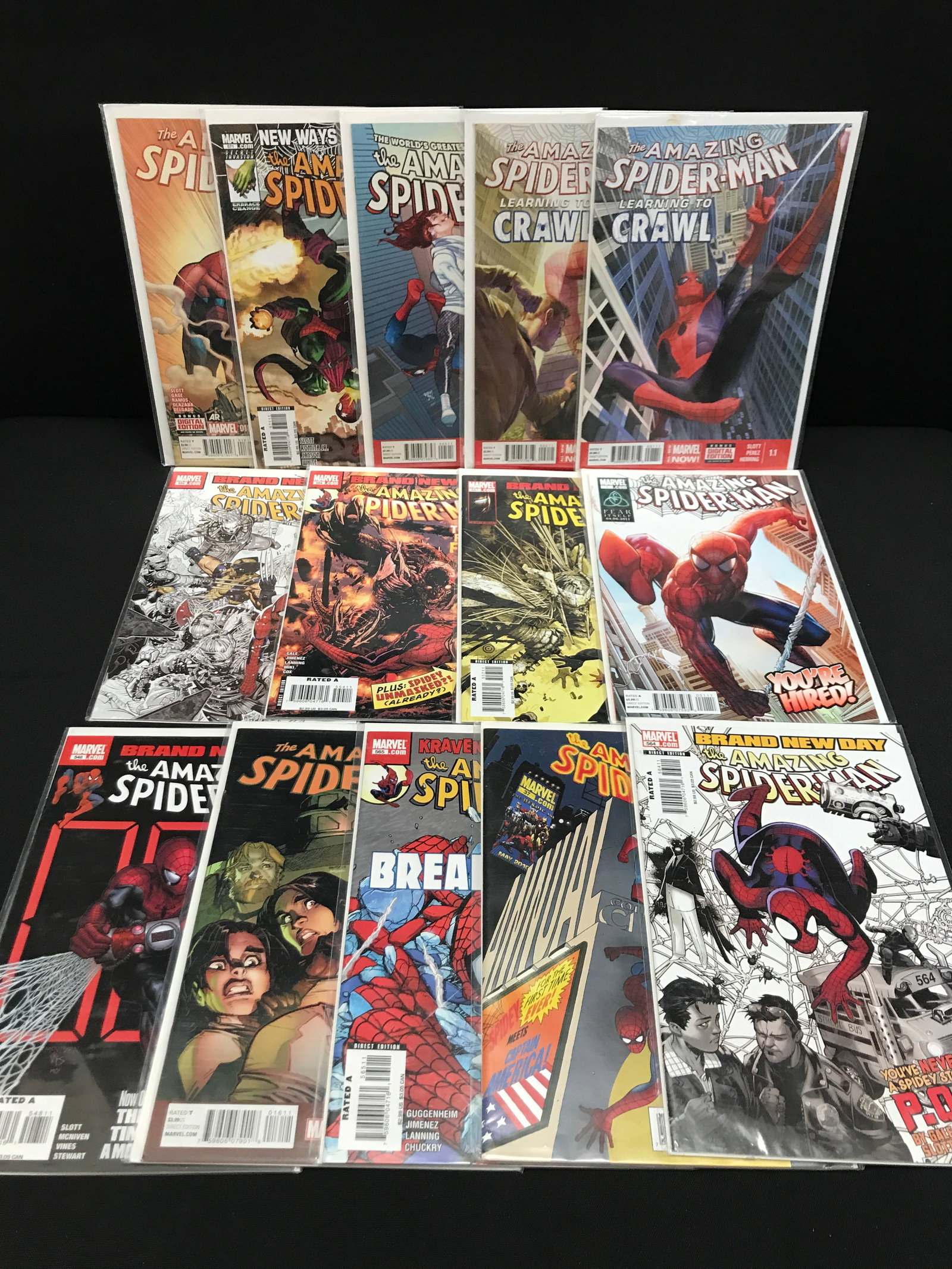 LOT OF 14 SPIDERMAN COMICS - MARVEL COMICS: Prices are in Canadian dollars