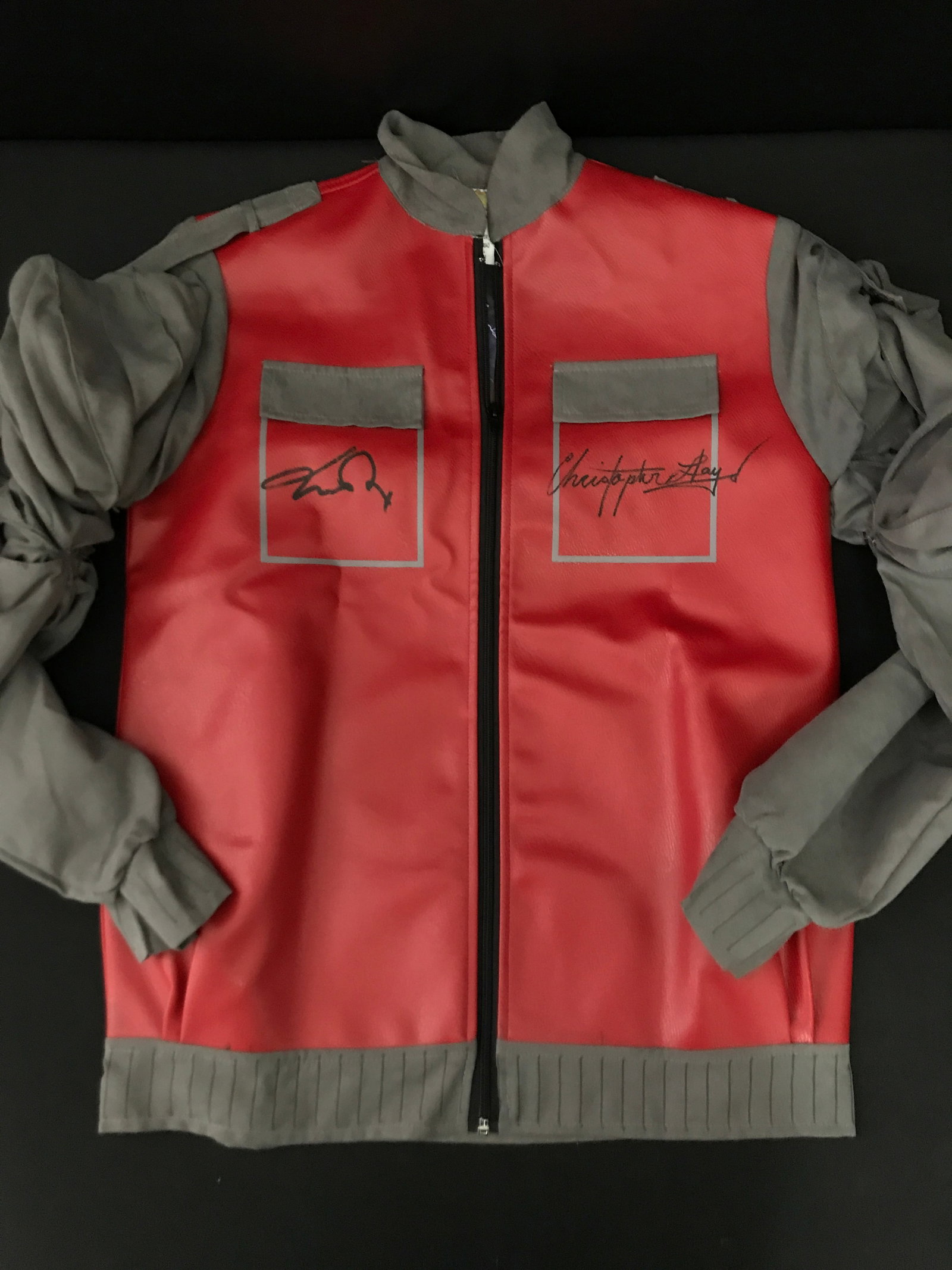 MICHAEL J FOX AND CHRISTOPHER LLOYD DUAL SIGNED BACK TO THE FUTURE JACKET - WWOC COA (1 of 2)