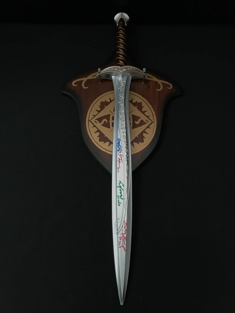 PROP SWORD SIGNED BY 4 LORD OF THE RINGS HOBBITS: ASTIN, WOOD, BOYD AND MONAGHAN - WWOC COA: Prices are in Canadian dollars