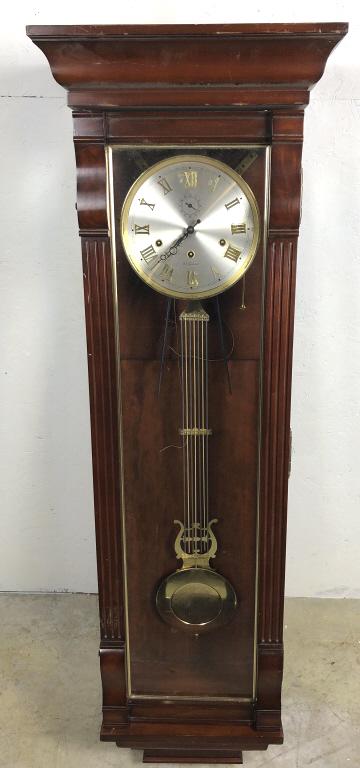 Mahogany regulator clock: Manufactured by WK Sessions, Germany 52” h x 16 3/4” w x 9 1/2”d Condition, some scratches and wear, some glue residue on face, untested
