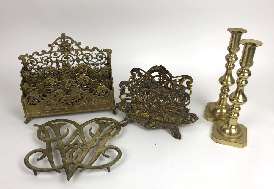 Group of brass table articles: Comprising Bradley and Hubberd letter holder, letter holder, trivet and pair of candlesticks Candlesticks 10 1/2"h Condition, needs cleaning