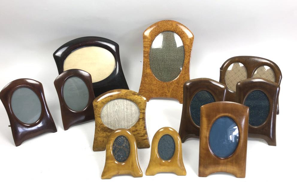 Group of wood table top pitcher frames: Approximately 10 Tallest 14 1/4"h Condition, some scratches and scuffs