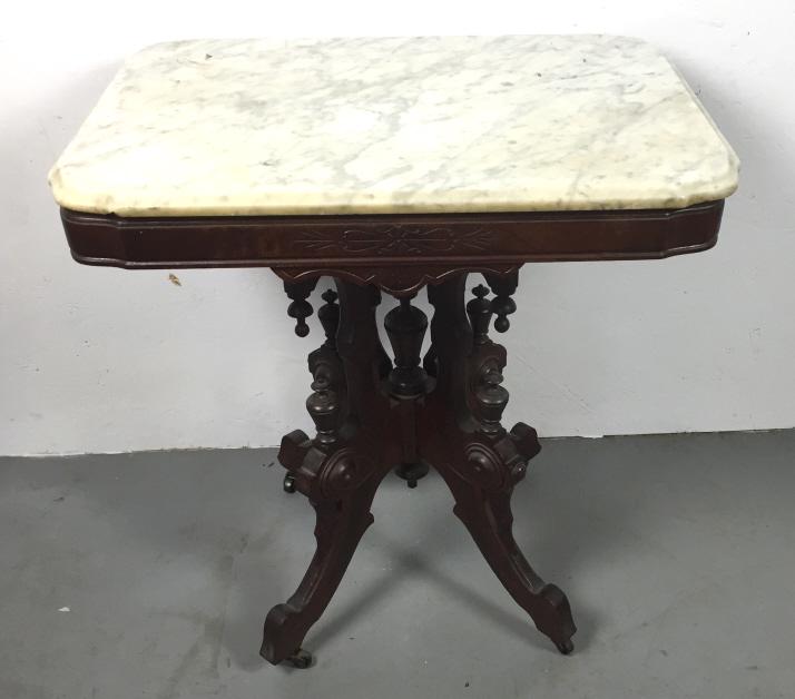 Victorian marble top side table: 30"h x 29"w x 21"d Condition, needs cleaning, scratches and paint residue