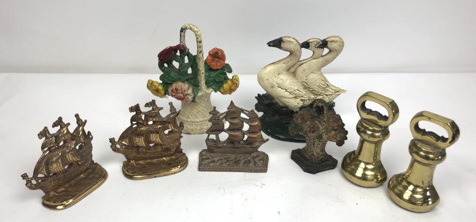 Group of metal door stops and bookends: Approximately 8 items Tallest 9 1/2" Condition, needs cleaning, chipped paint