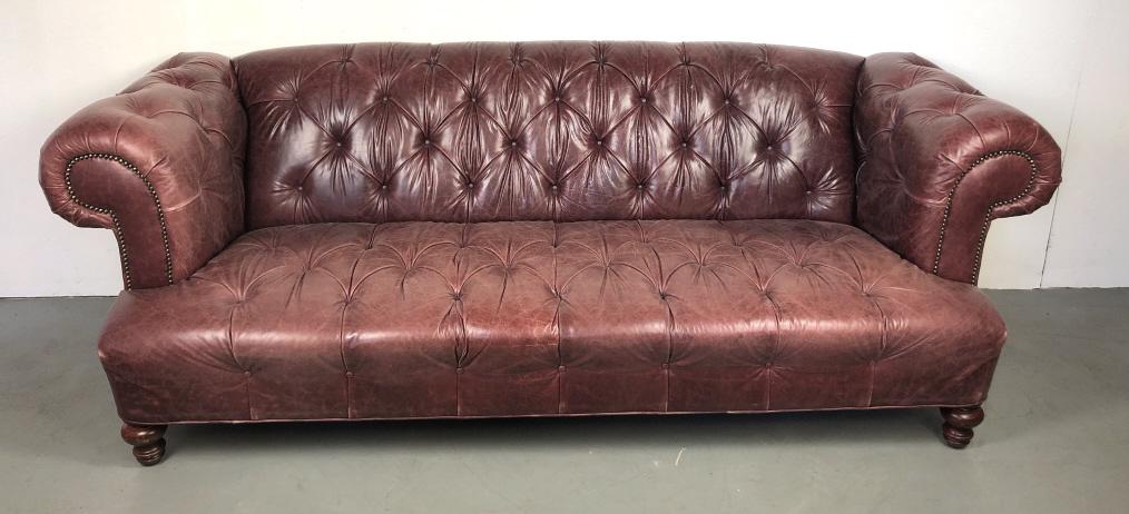 Chesterfield style leather sofa: 34"h x 96"w x 38"d Condition, some scratches