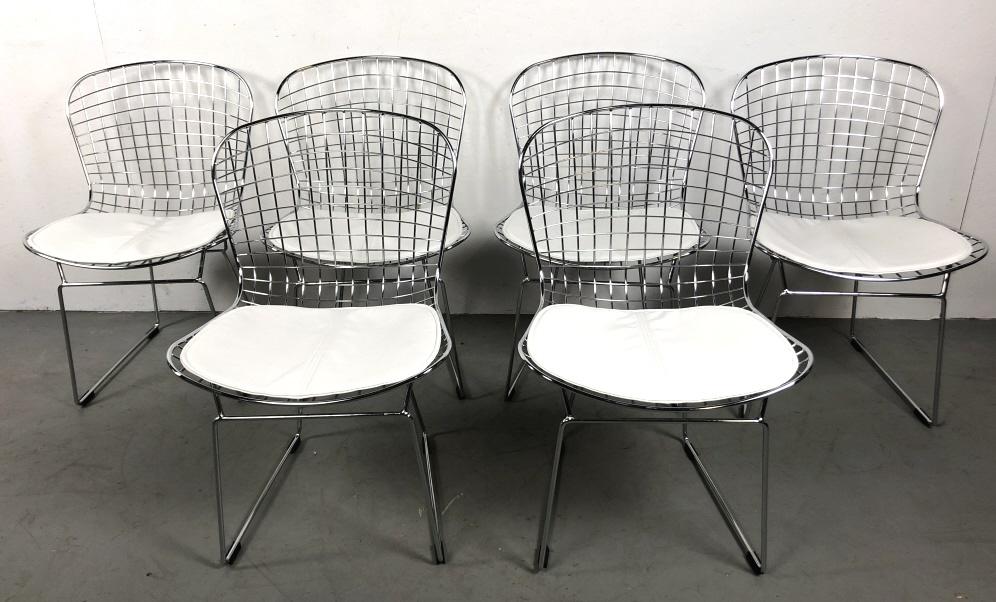 Set of 6 Harry Bertoia style chairs: Chrome and wire 32"h x 20 1/4"w x 19 1/2"d Condition, good