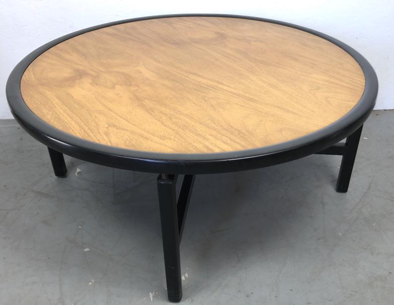 Baker blond wood and ebonized circular low table: 16"h x 37 1/2" dia Condition, some scratches and scuffs