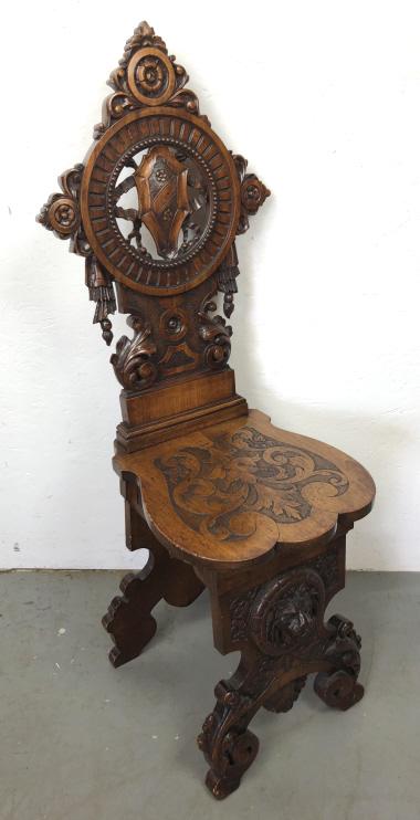Italian carved mahogany hall chair: 19th Century, with paper label under seat 42"h x 14"w x 18"d Condition, some scratches