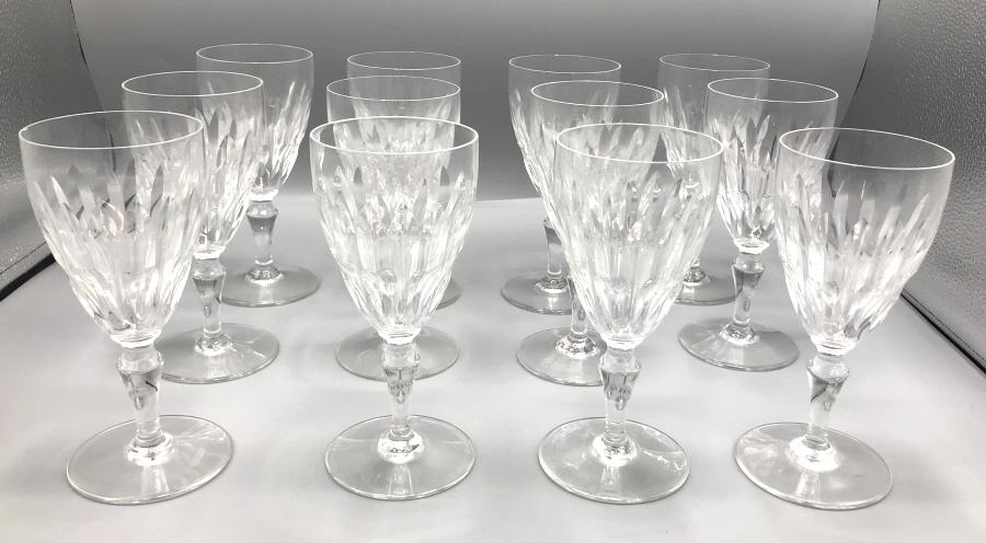 Group of 12 Baccarat wine glasses: 7 1/4"h Condition, one glass chipped on rim, one chipped on base