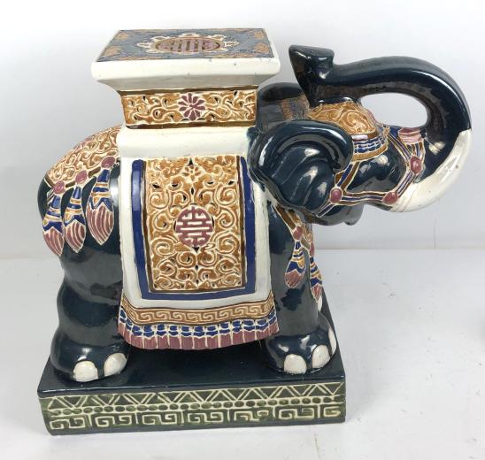 Porcelain elephant garden table: 22"h x 24"w x 10"d Condition, firing cracks
