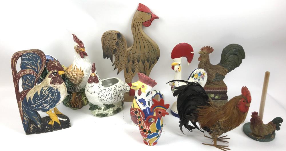 Group of roosters: Including, ceramic, wood, composition and feather Approximately 10 items Tallest 23" Condition, some paint loss and chipped paint
