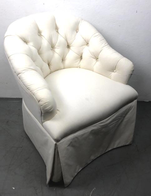 White upholstered vanity chair on caster wheels (1 of 5)