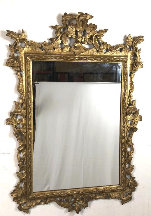 Rococo style giltwood mirror: 49 1/2"h x 34"w Condition, some wood loss, old repairs chips