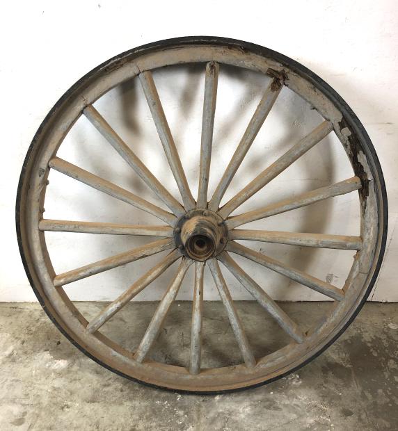 Wagon wheel: 42" dia Condition, some rotten wood, needs cleaning, one drilled hole on metal rim