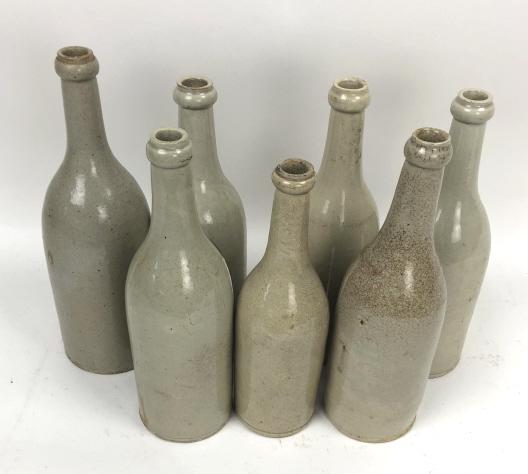 Group of 7 French ceramic cider bottles (1 of 8)