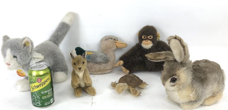 Group of Steiff stuffed animals: Together with two animals with no labels Largest 8 1/2"h Condition, good